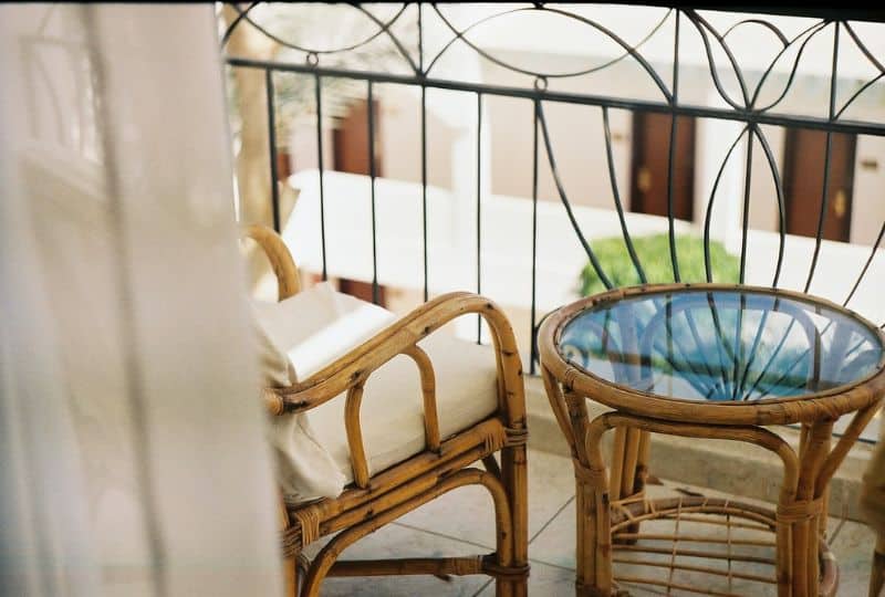 Natural rattan furniture set-up on a balcony
