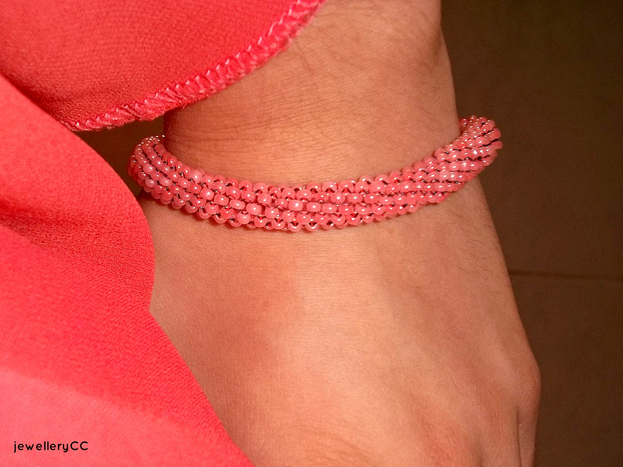 Pink beaded bracelet close up