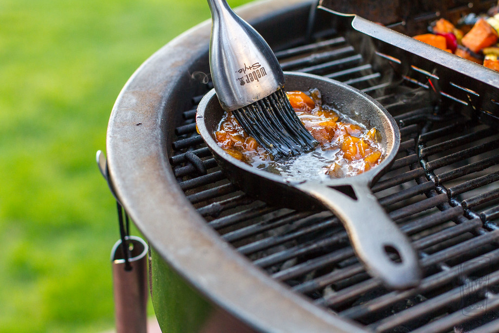 A spatula for grilling, flipping the grilled corn on the grate.