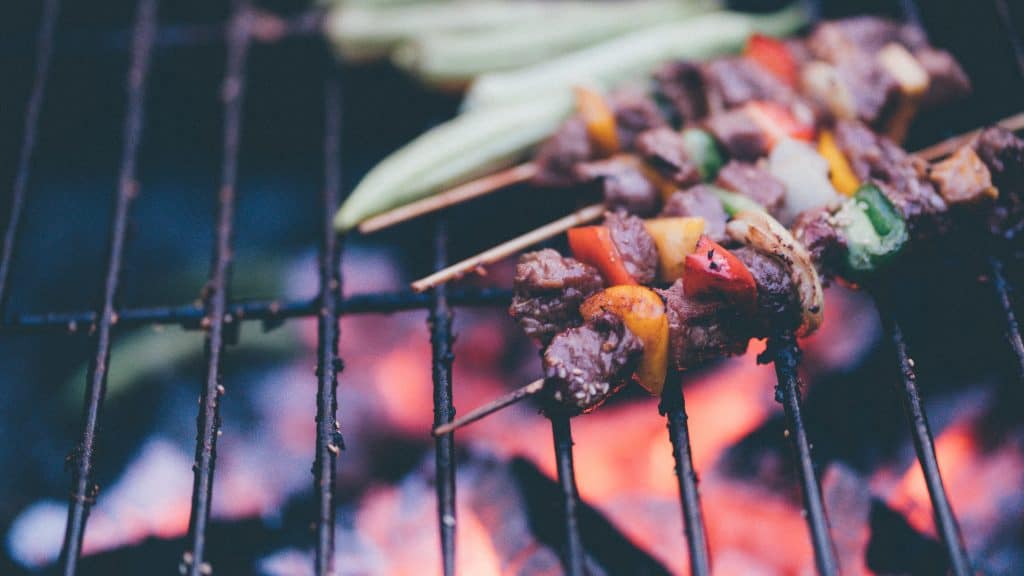 BBQ skewers on open grill