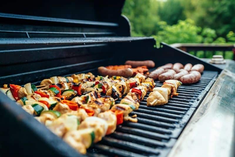 Kebabs, sausages and other variety of BBQs on the grill