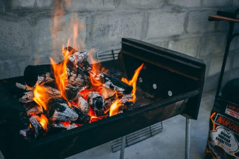 A well-lit charcoal on the grill