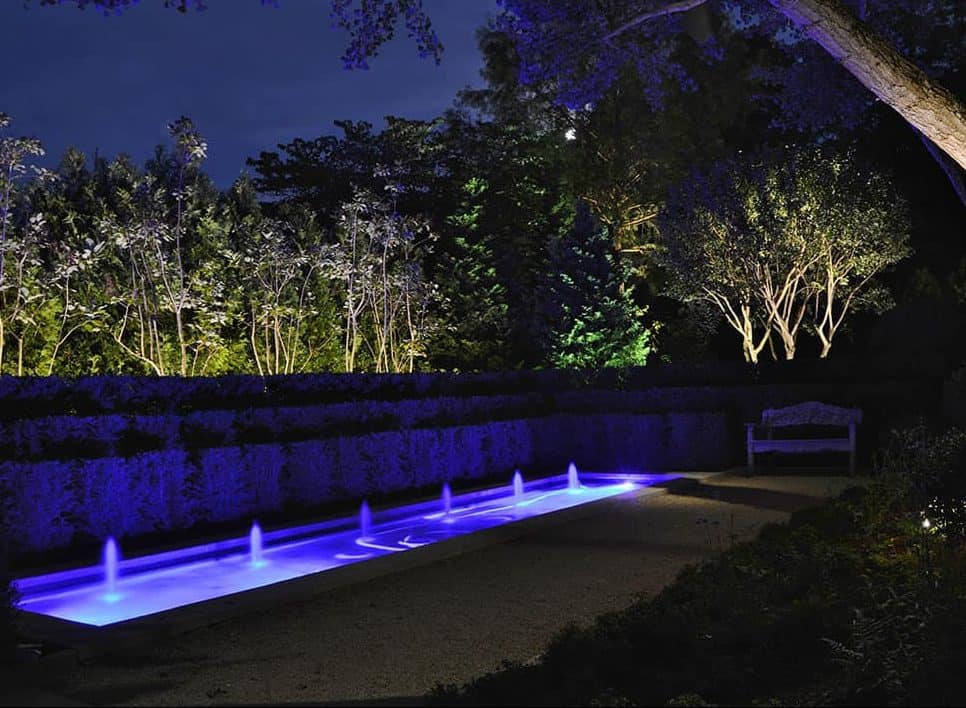 A garden water feature with colour changing, LED fixtures.