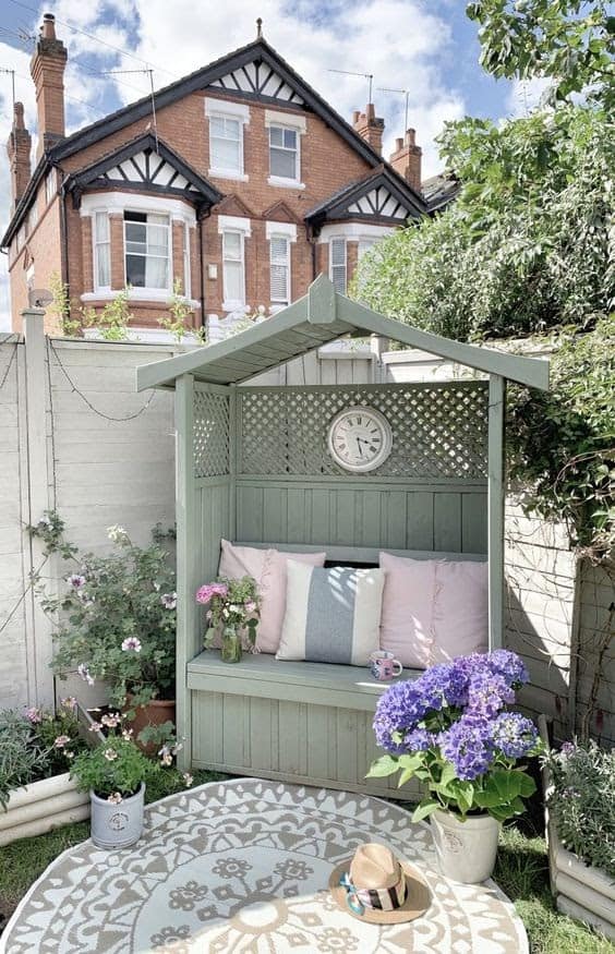 A small arbour creating a perfect cosy corner to relax in