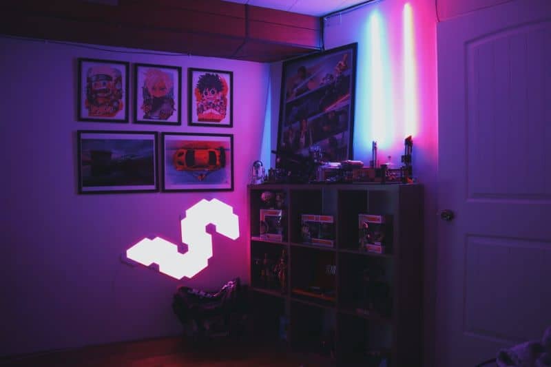 room interior with decals, posters and neon lights