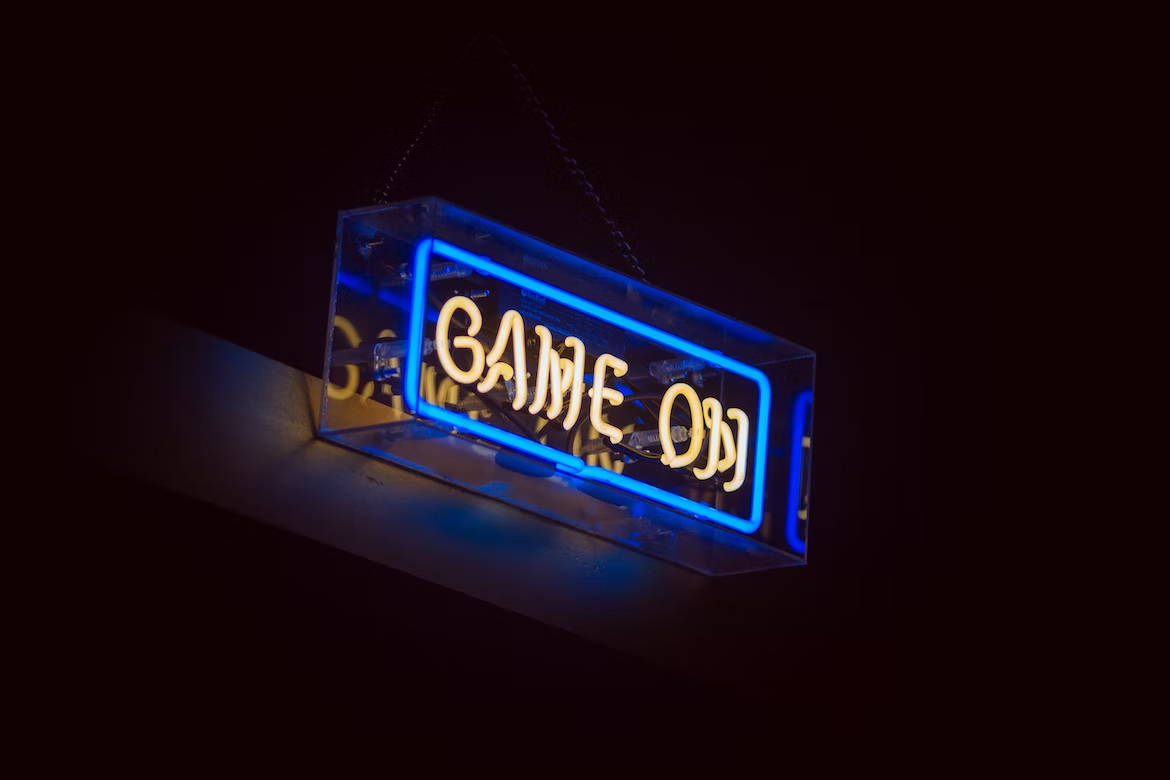 A neon sign that says "game on"