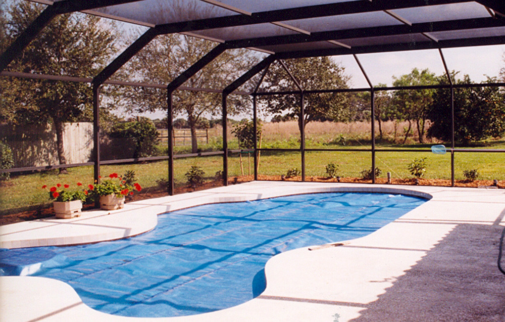 A backyard pool with canopy for shade