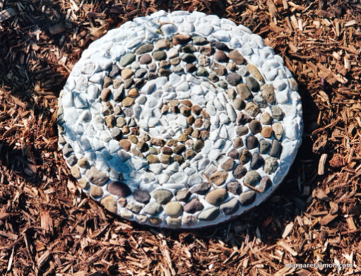 Big pebble spiral stepping stone.