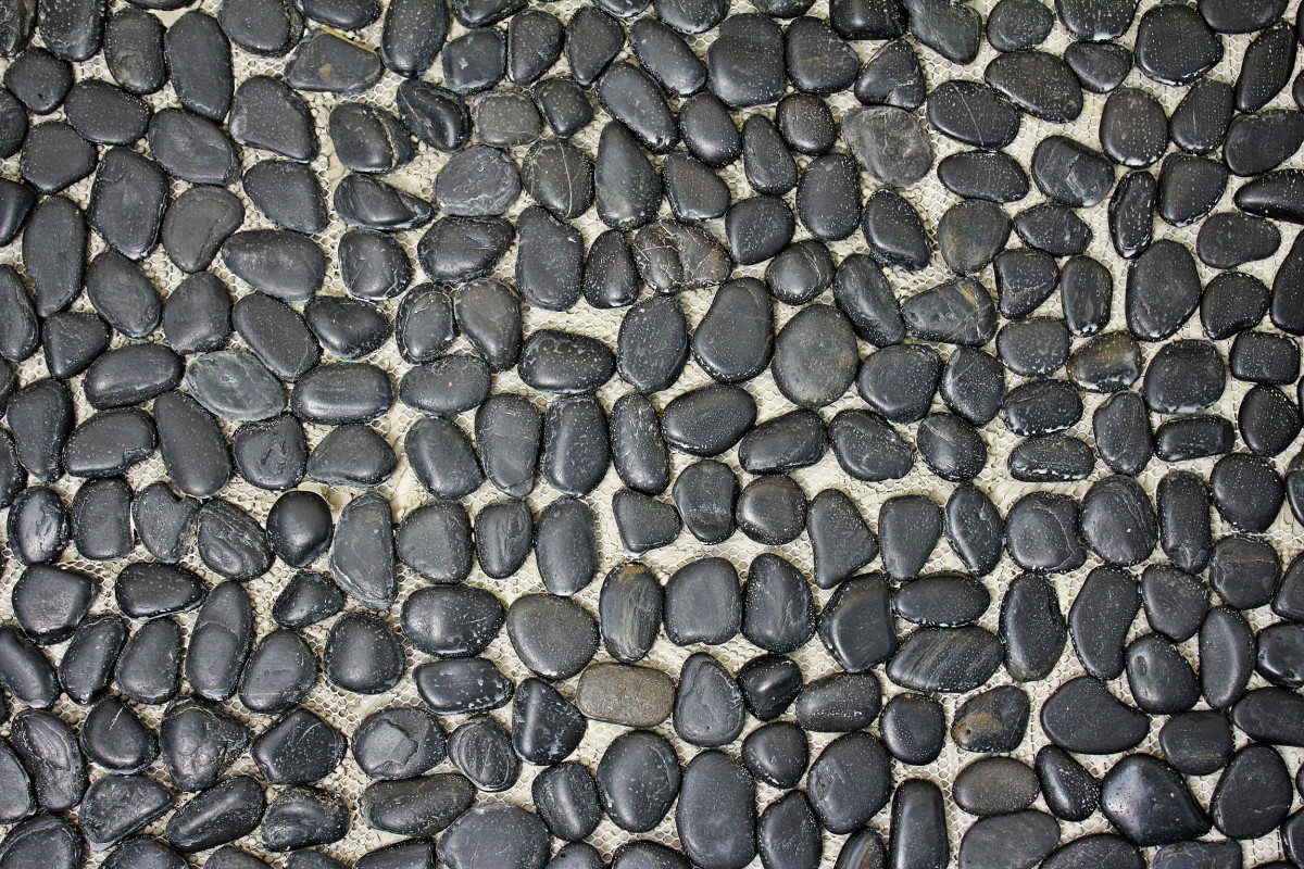 Black pebbles paving