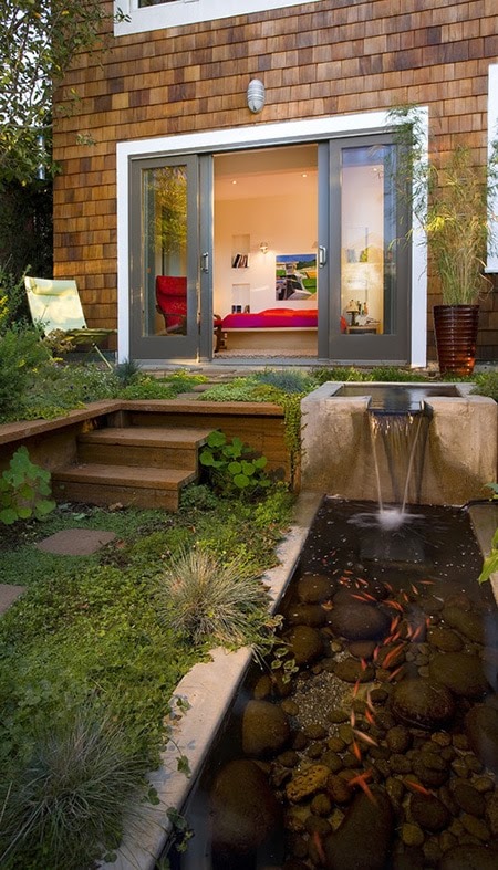 An innovative oblong pond with stunning water features
