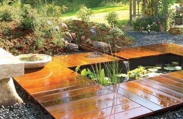 Garden pond and wooden deck