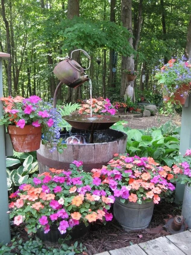 Recycled old teapot used as water feature decoration/fountain