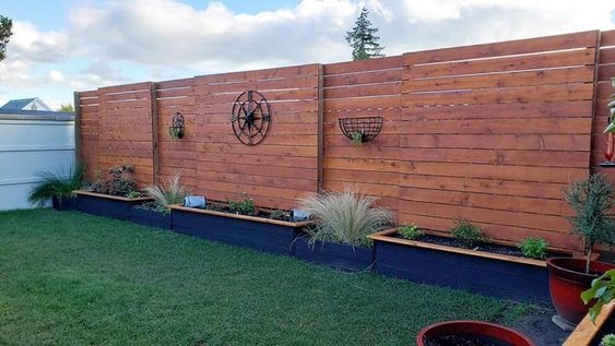 Raised garden beds along your fencing 