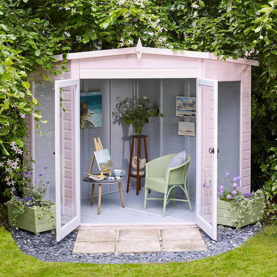 Mini shed studio painted in pink and lilac colours