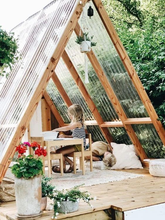 A unique triangular-shaped playhouse