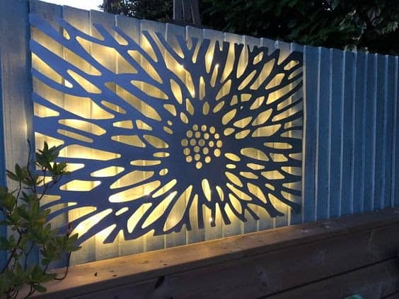 An old fence with majestic laser cut metal art
