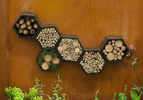 Small logs wall decoration - an abstract work of art