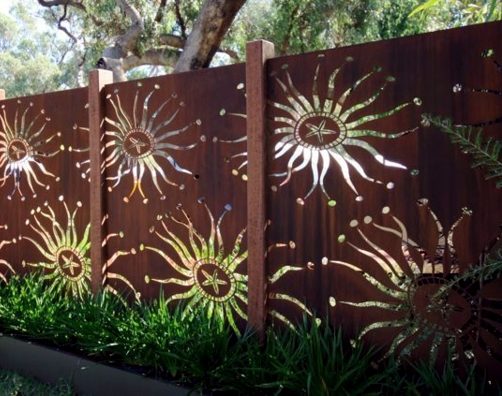 A garden fence made of wooden materials and designed with beautiful accents