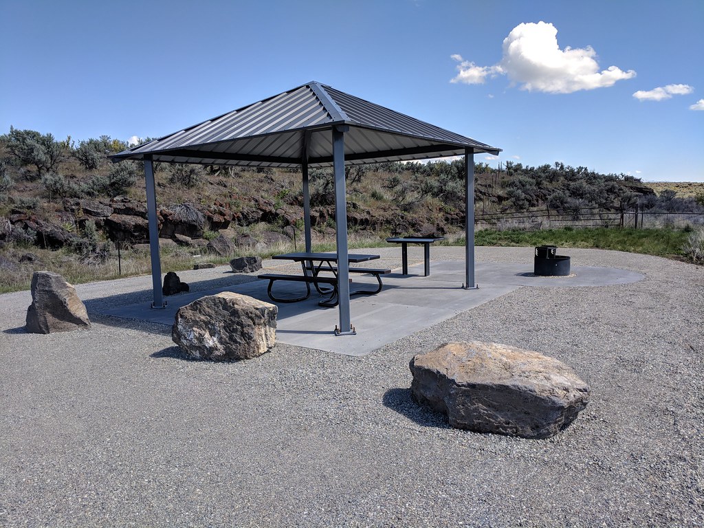Gravel park with gazebo and seating area