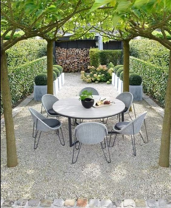 Trees are used as shade for outdoor dining