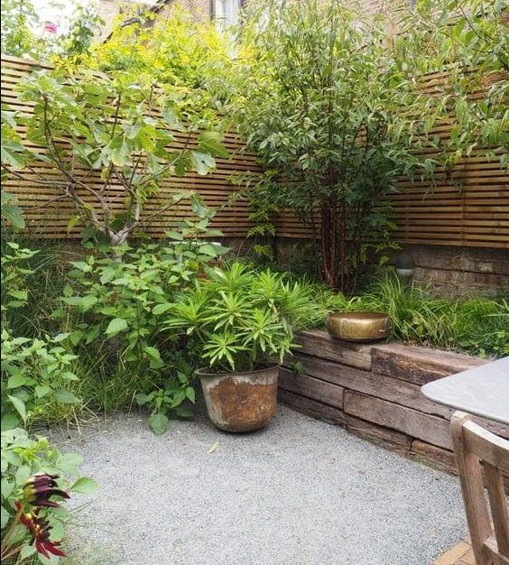 Raised garden bed with gravel paving