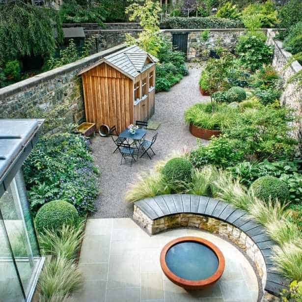 A cosy backyard space with small stone pathways