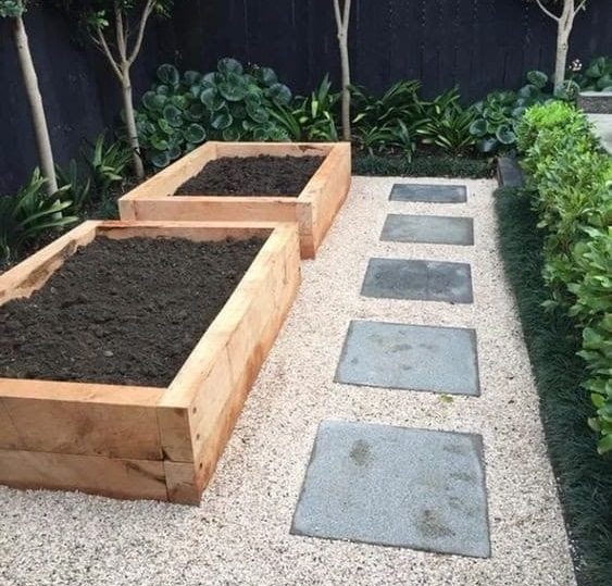 Gravel as a filler around raised beds and paving stones