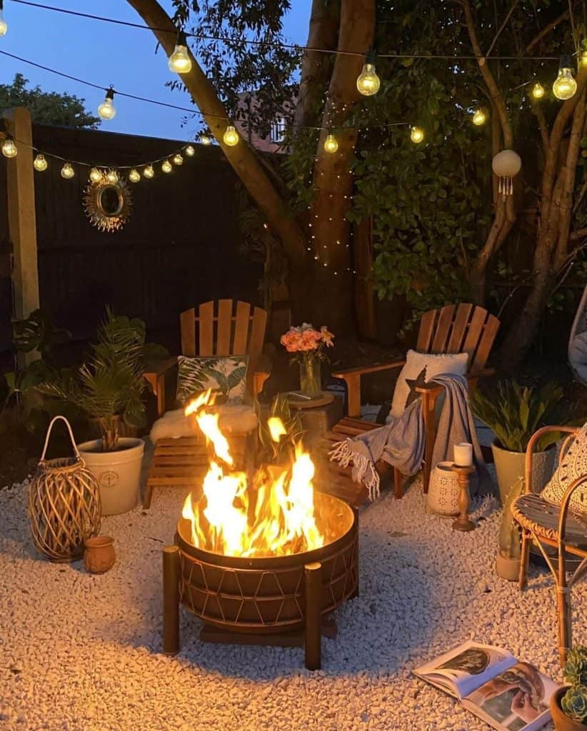 fire pit with lights on gravel