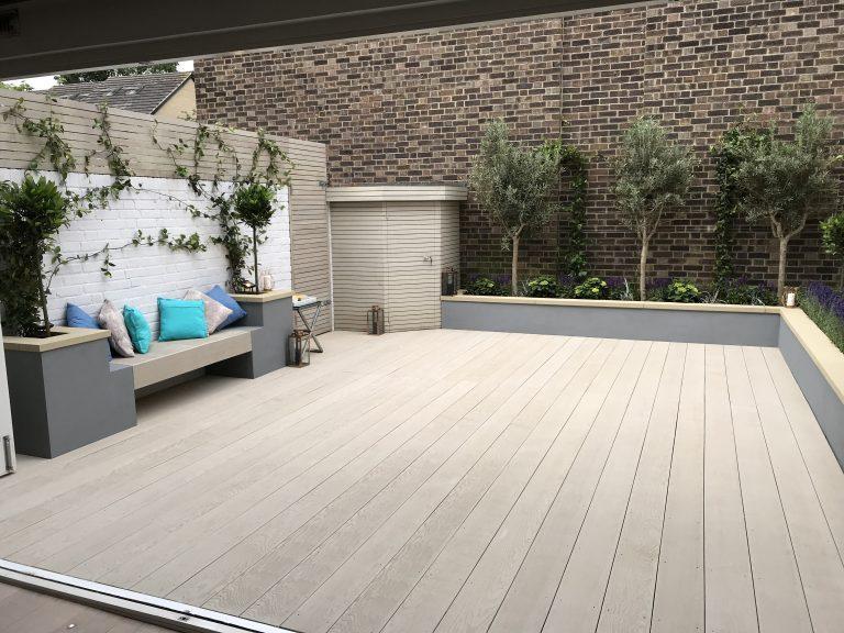 contemporary modern garden with large decking area