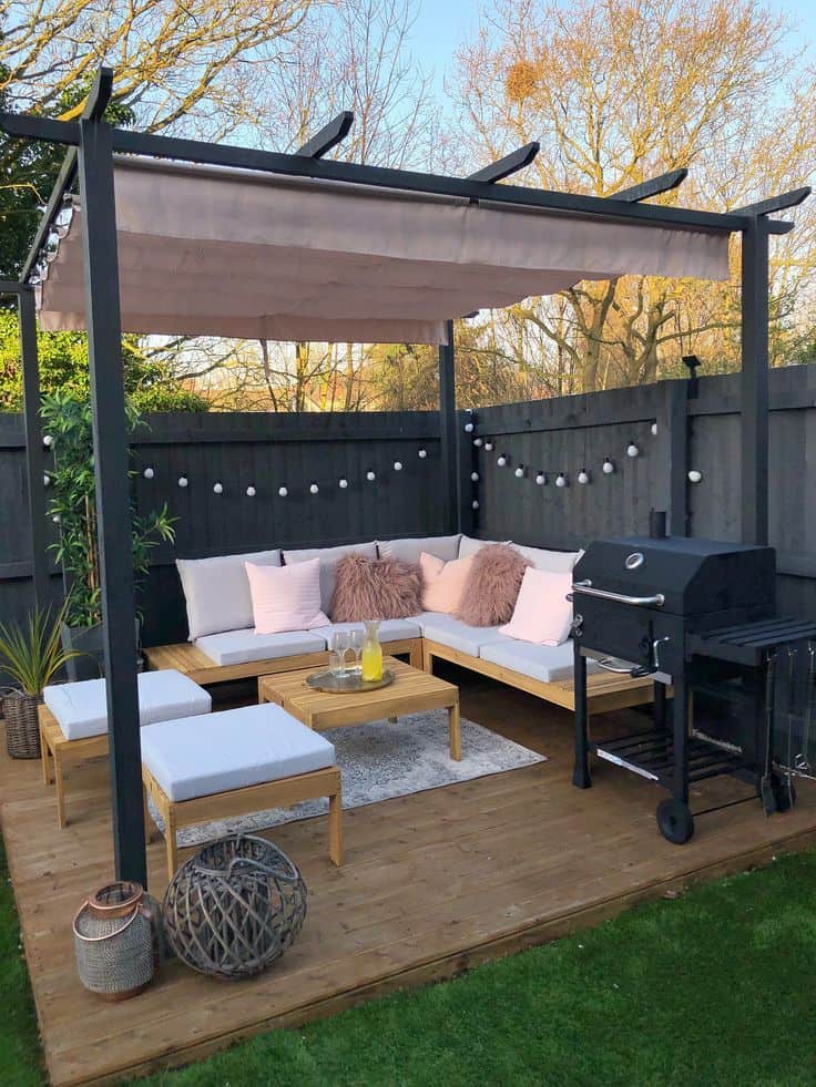 comfy pergola with a grill