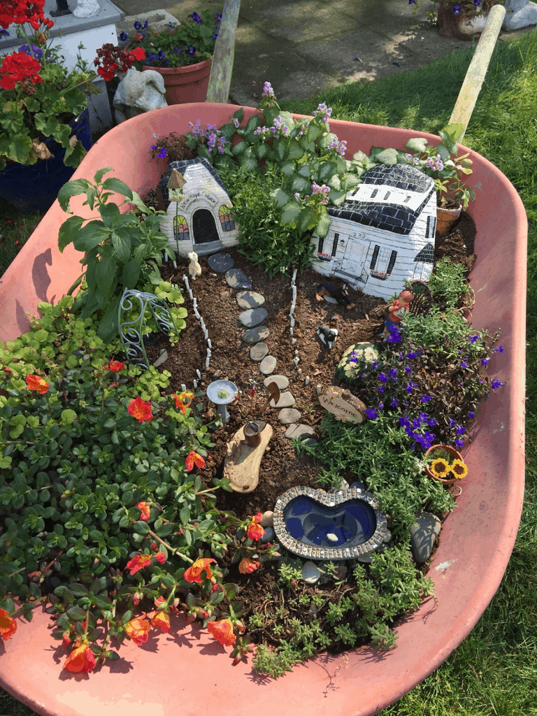 wheelbarrow fairy garden