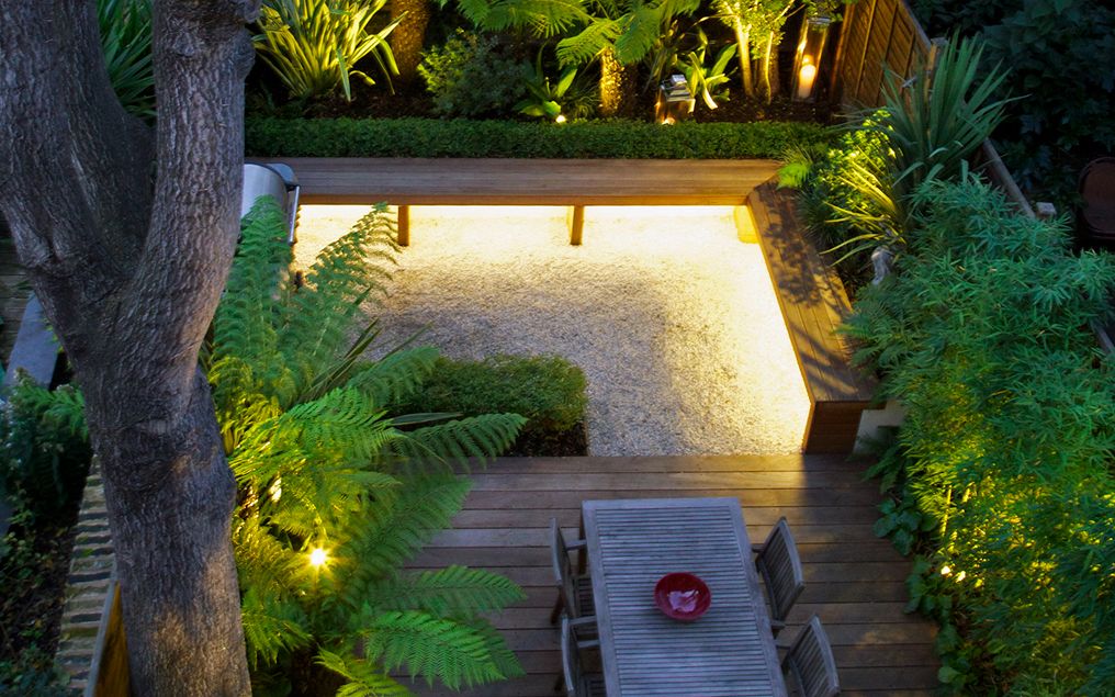 Sloped garden idea with modern lighting