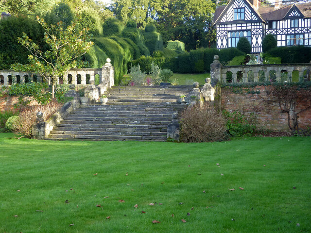 Stone retaining wall and stairs on a sloped garden