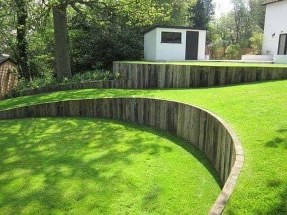 Retaining wall creating a two-level backyard.