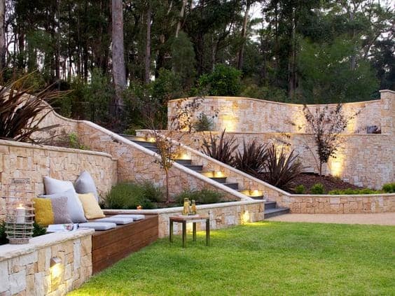High retaining walls with lighting and outdoor seating