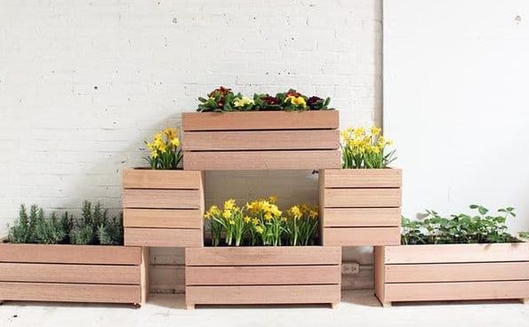 DIY wooden stacked planter perfect for a classic style garden