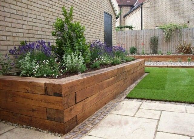 Side garden beds made from wooden material