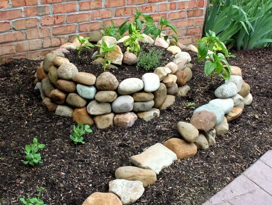 Spiral garden beds made of stones