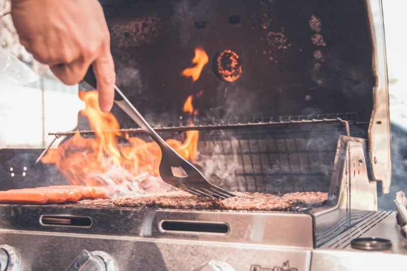 High flames on a burner BBQ grill