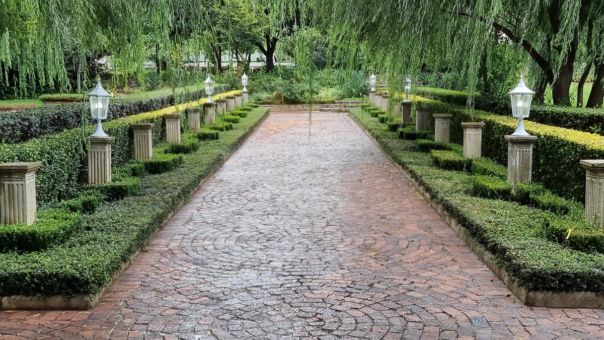 Brick pathway with hedging