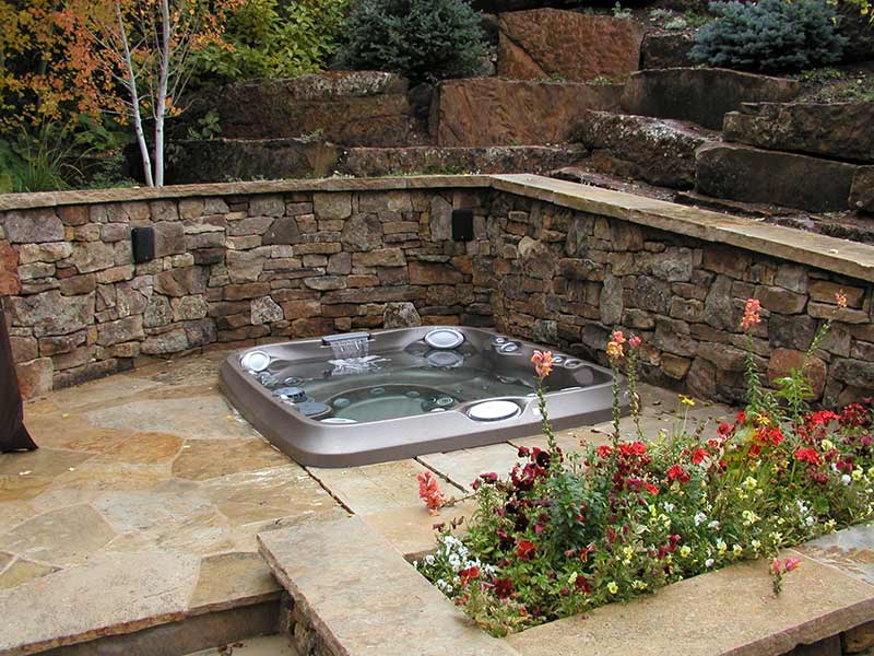 Faux stone concept hot tub area