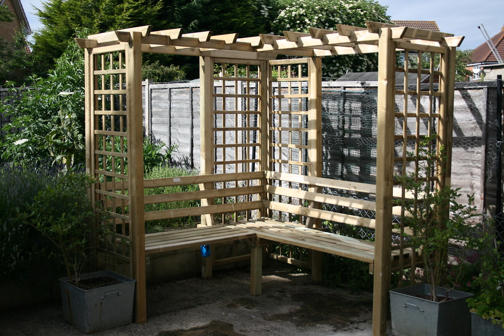 DIY wooden arbour with built-in benches