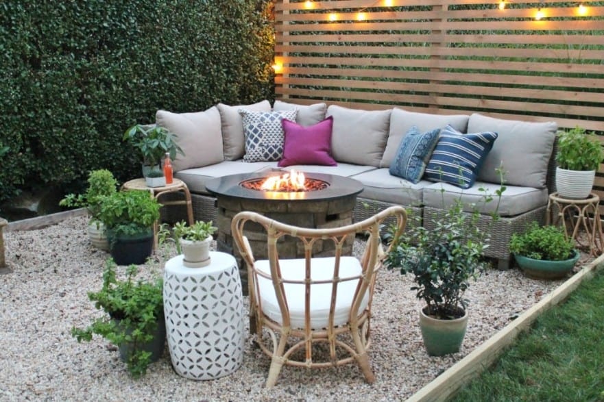 Corner fire pit with a fenced-off patio