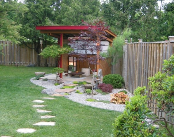 Tucked Asian-style pavilion in a serene corner garden