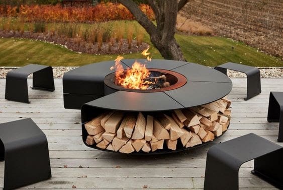 Modern black fire pit and small benches