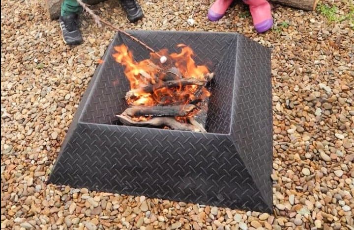 DIY fire pit made from an old steel sheet