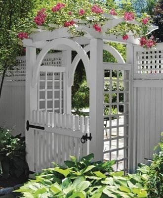 White arbour gate with flowers