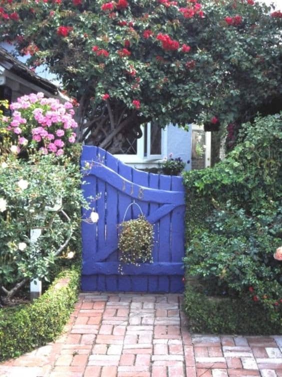 Blue small gate with hanging basket