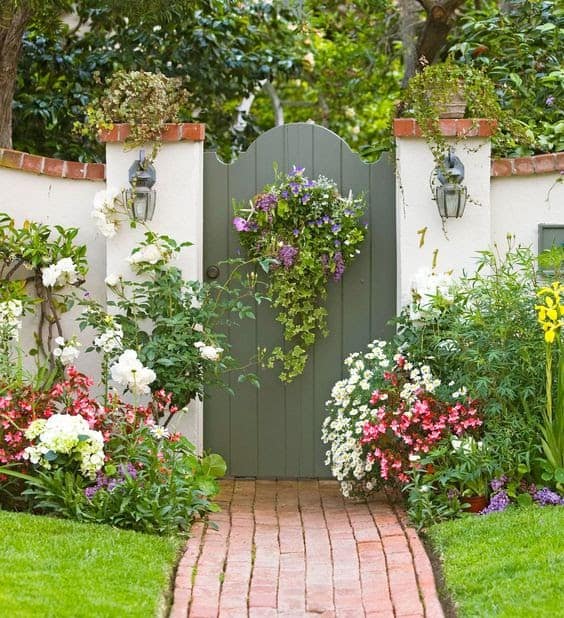 Wooden gate combines with colourful flowers