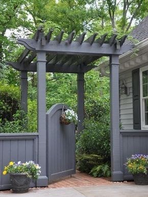 Grey gated arbour and fence